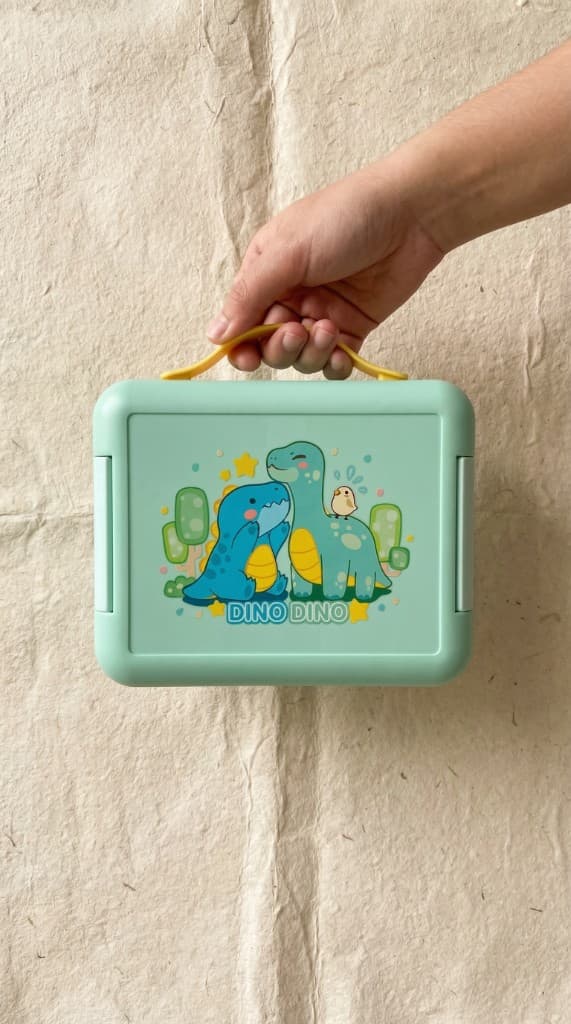 Mint kids lunch box with dinosaur design